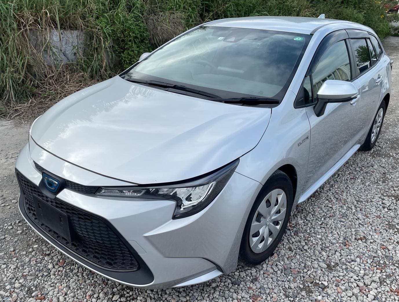 Toyota Corolla Touring Hybrid 2020 — shipped to Australia